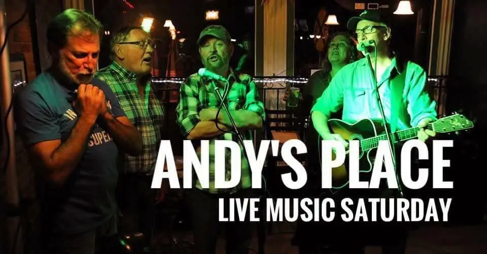 A group of local musicians singing together on a Saturday night at Andy's